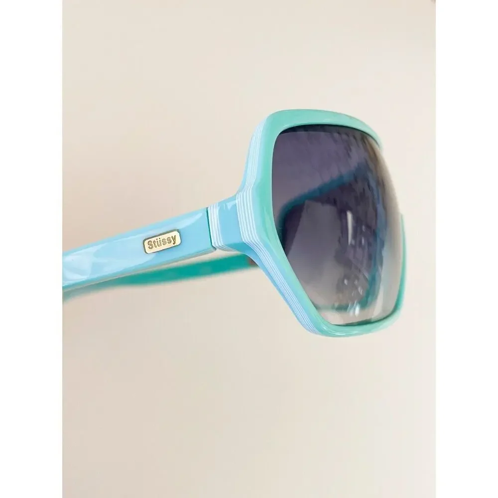 Stussy Mint Green Shield Sunglasses with Gradient Smoke Lenses
